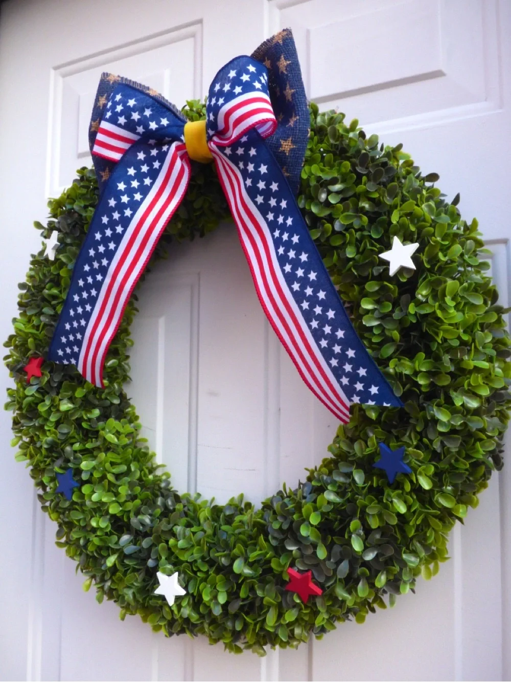 Patriotic Green Boxwood Wreath with Red White Blue Stars and Bow